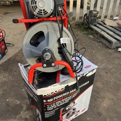 Auger declogging machine deals