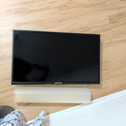 Mounted TV- Works Perfect. $10