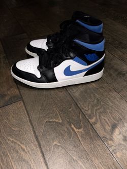 Black and blue Jordan 1 mid Sneakers