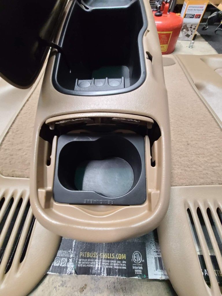 beige console and door panels