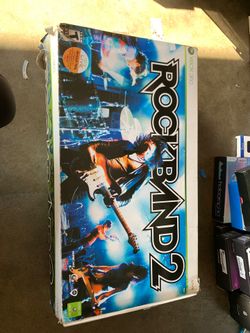 Rockband drums in box with pedal drumsticks