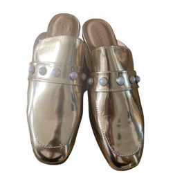  City Classified Gold Pearl Mules Slip On Sandals are a stylish and comfortable footwear option for women. These sandals feature a slip-on closure and