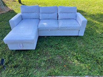 White Faux Leather Sleeper Sectional with Storage Chaise