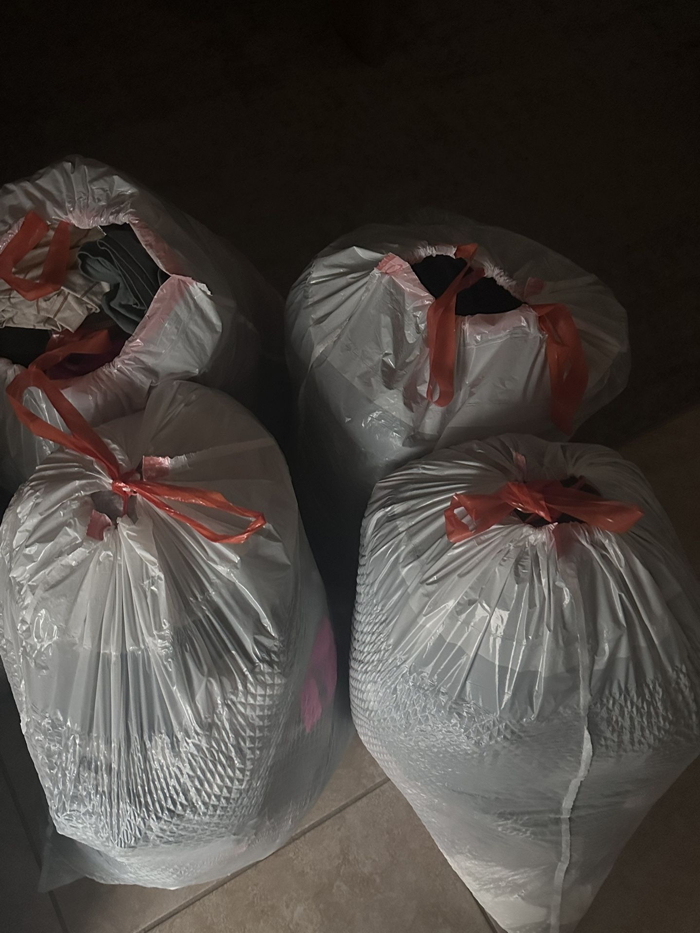 4 Bags Of Clothes