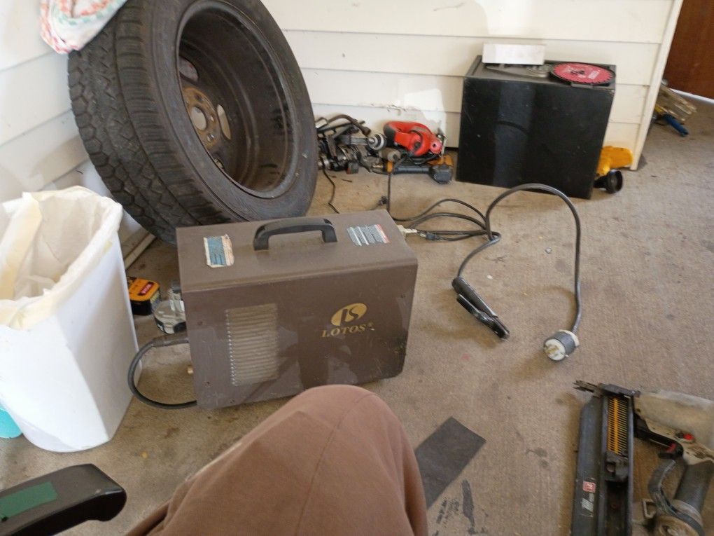 A LOTOS(CT520D) 50Amp Air Plasma Cutter, And 200Amp Stick/Arc &Tig Welder. 3in1 Machine No Cords Included 