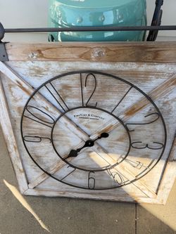 Large wood outdoor clock.