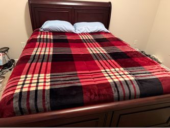 Beautiful queen-size sleigh with premium Bob-O-Pedic Copper Radiance memory foam mattress.