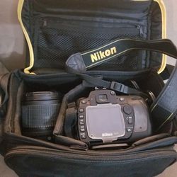 Nikon D80 camera, lenses, charger, 2 batteries, and carrying case