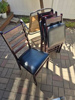 Padded wood folding chairs (4)