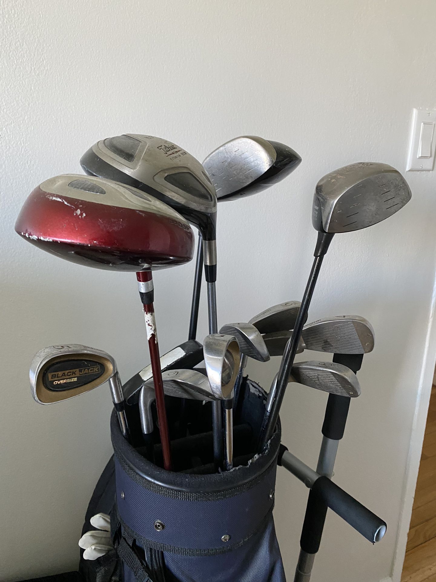 Golf Club set - 3 drivers, set of irons, putter, bag, glove, and balls