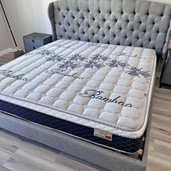 Brand new king size grey linen upholstered platform bed frame. 