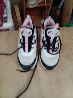 Tennis shoes with rollers in them $4 size 12