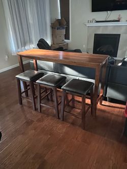 Bar table with stools