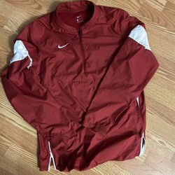 Small red Nike windbreaker 