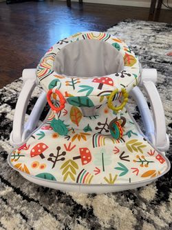 Infant chair with toy