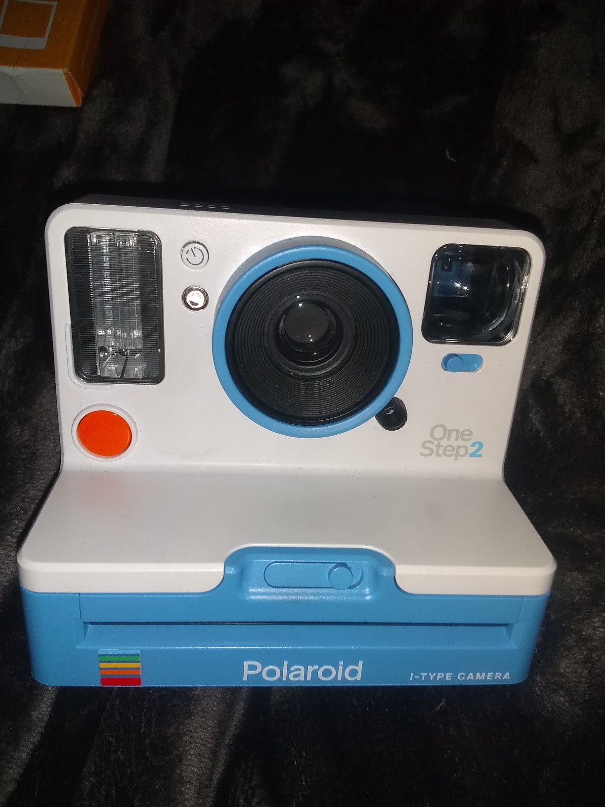 Full-size Polaroid camera with extra pack of film