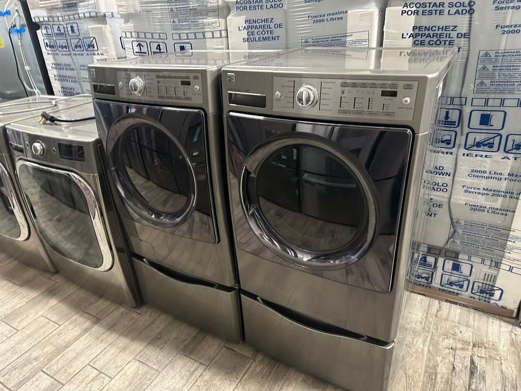 Kenmore elite stainless steel Frontload washer and dryer set electric used