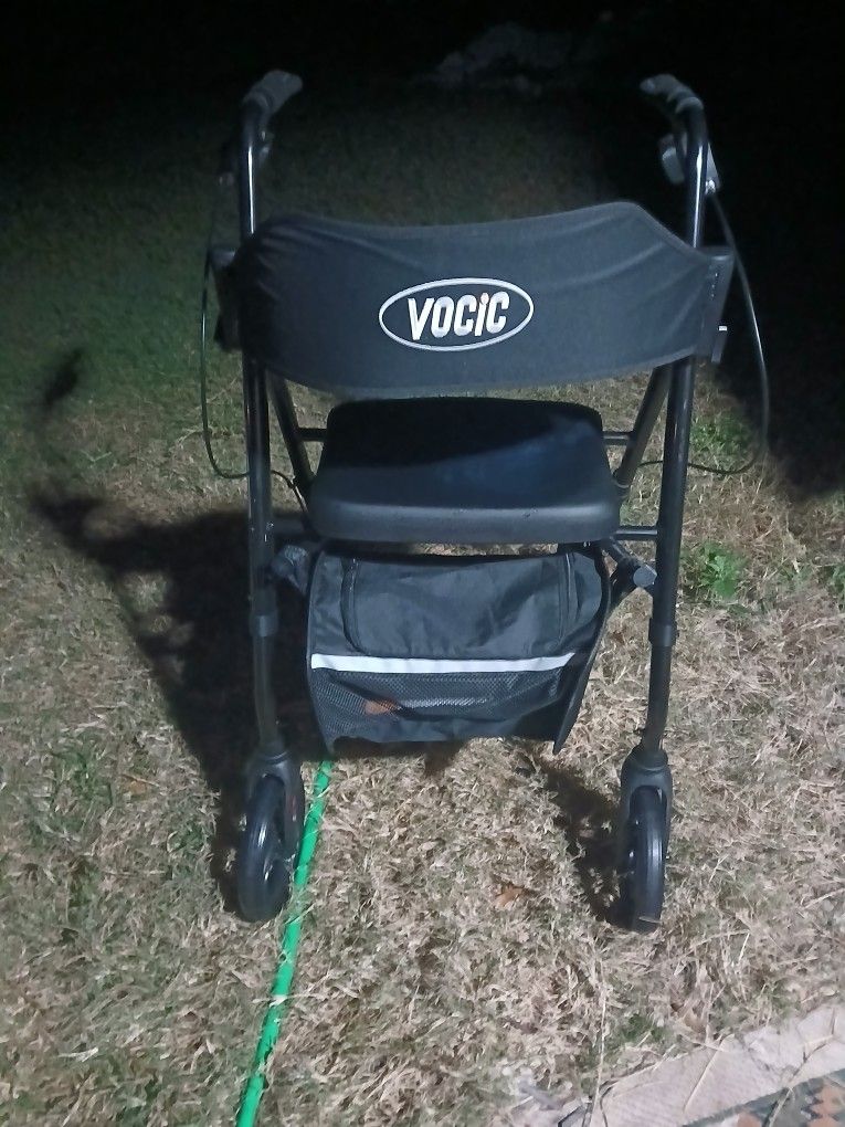 A Walker And Medium Men's Diapers