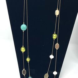 Extra long necklace. Gold tone, green, light aqua, turquoise colored beads.  60” + 4” extender