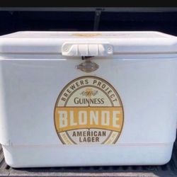 Guinness Blonde American Lager rare ice chest by Coleman Steel Belted.  54-Quart Capacity Ice Chest  Accommodates Up to 85 Cans.