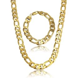 New 18 k yellow gold figaro chain and bracelet set