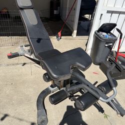 Adjustable bench with leg/preacher curl attachment