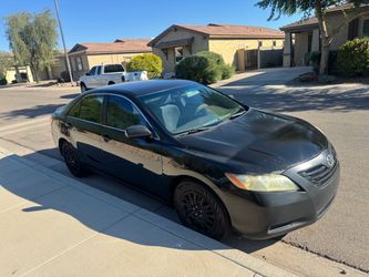 Mechanic special 2008 Toyota Camry four-door automatic full loader. All power runs and drives. Good needs back brakes back. Brakes are grinding when c