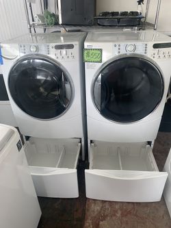Kenmore front load steam washer & dryer set with pedestals working perfectly with 4 months warranty
