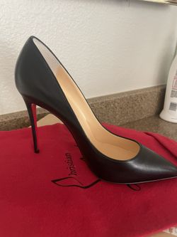 Black Louboutin Pumps