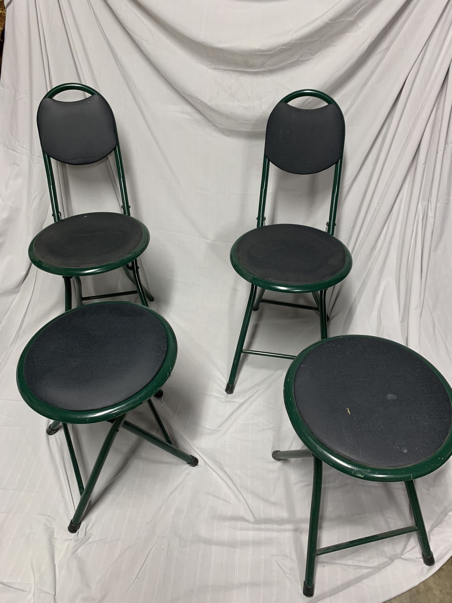 Folding stools with padded seat and backrest