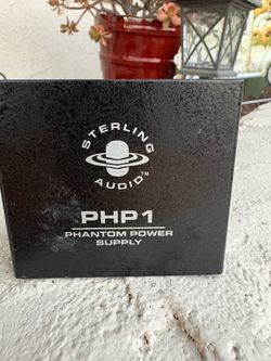black Sterling Audio PHP1 Phantom Power Supply, which provides +48V phantom power for condenser microphones