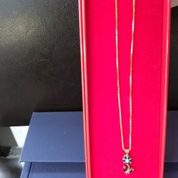 14k Flower Pendant With 8 Blue Stones 16" Chain