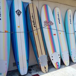 Free wetsuits selling 411 surfboards