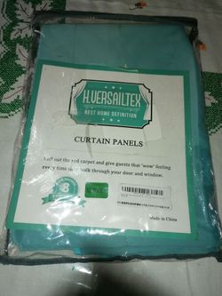 Brand new Curtain panels blue color size 52in x 18 in