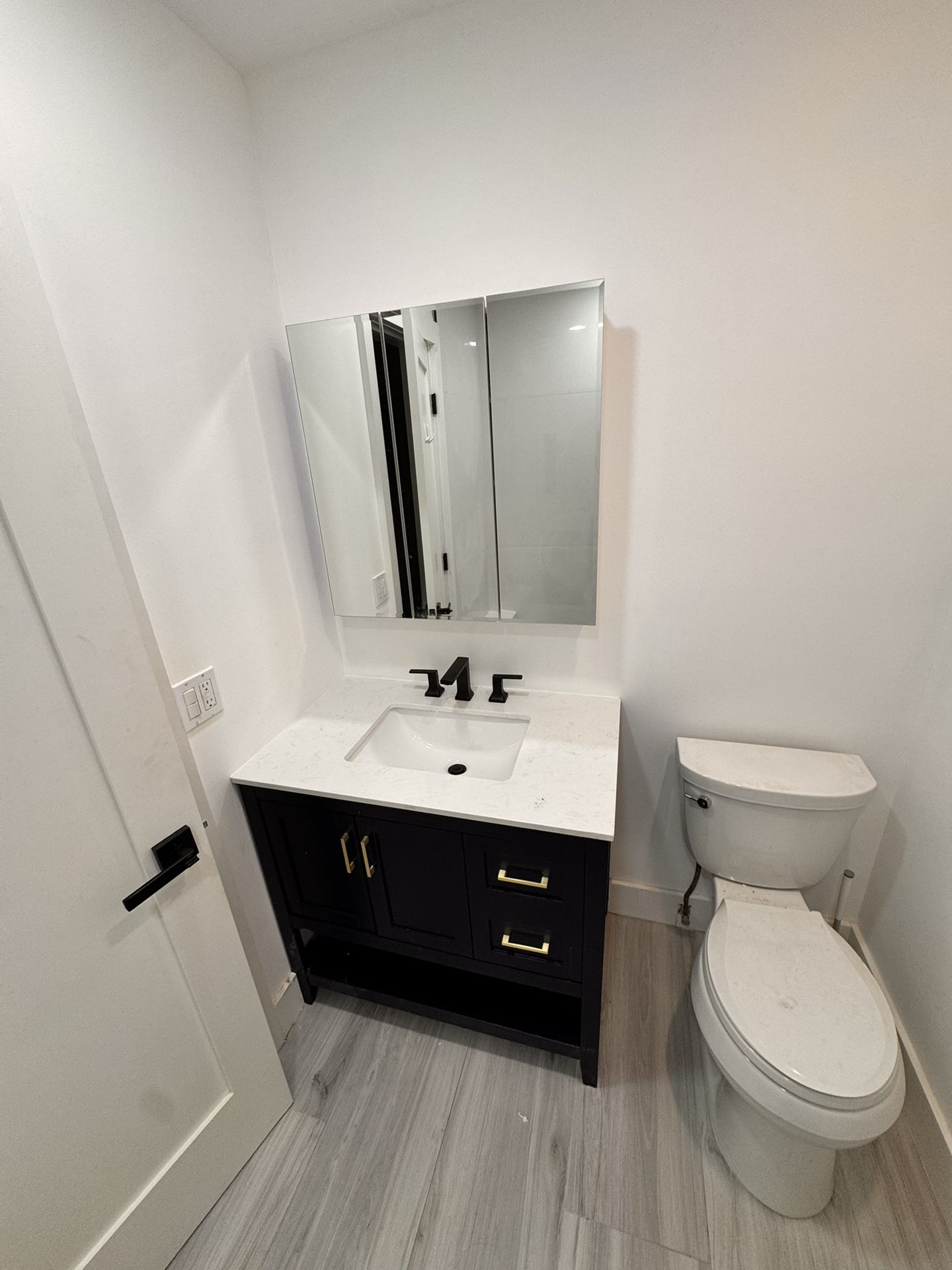 Bathroom Tile With Toilet And Beautiful Vanity