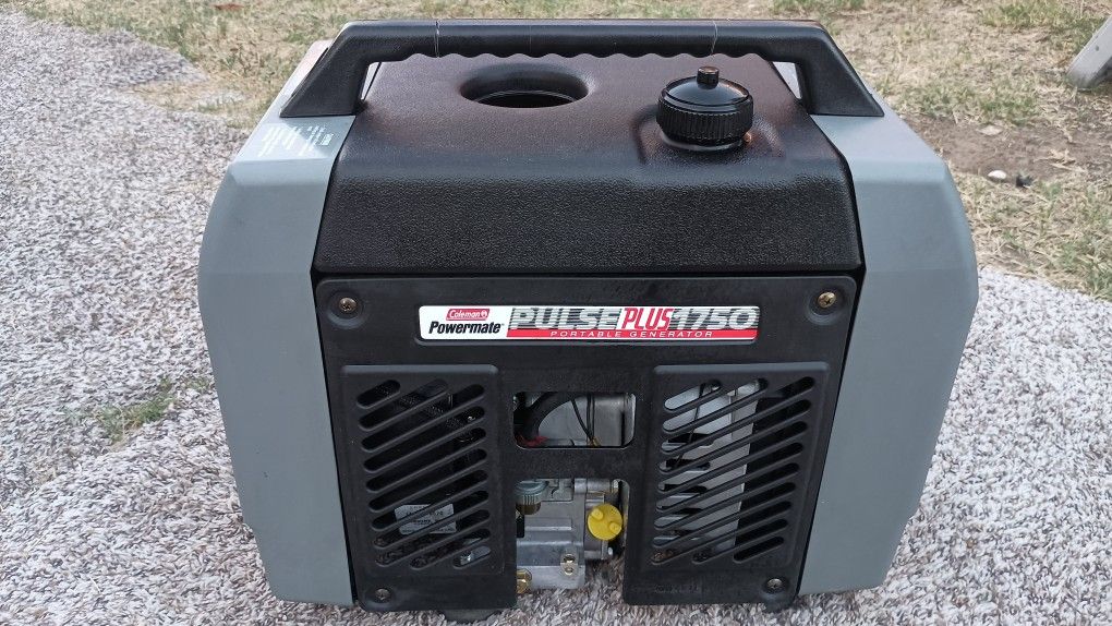 Coleman Power Mate Generator 1850 Watts, Portable, Cover Included. Looks Like New