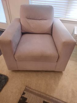 Beige fabric swivel chair