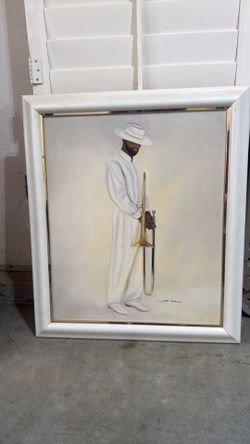Framed art piece titled "Jazz Man Trombone