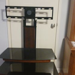 Three Tiered Smoked Glass TV Stand In Perfect Condition , At The Bottom 41 In Wide And 4 Ft High