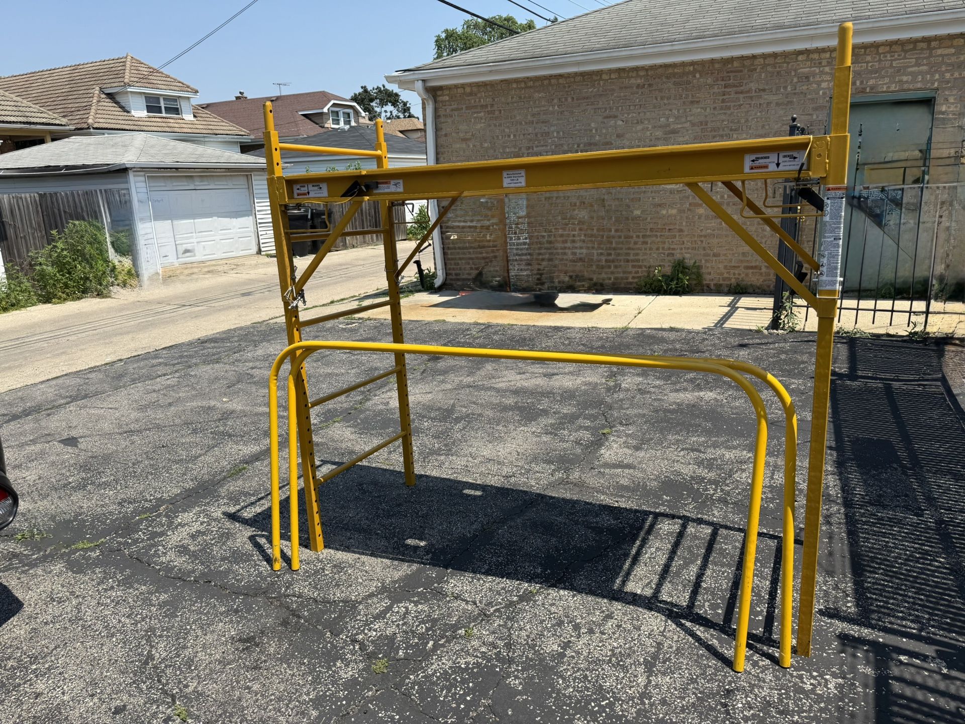 PORTABLE SCAFFOLD IN GOOD CONDITION. $150.00 OR BEST OFFER