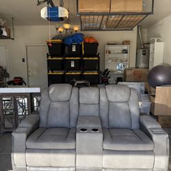 Ashley Furniture Grey Power‑Reclining Loveseat – Like New!