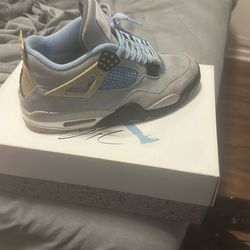 University Blue Jordan 4