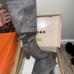 Women’s grey suede boots