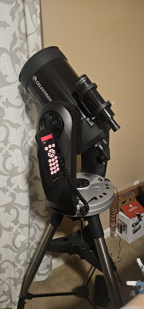 Celestron CPS series 8" electronic telescope with tripod and accessories