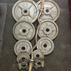 Olympic weights 230lbs total plus curl bar