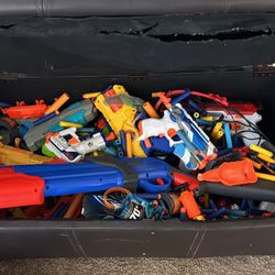 Toy Box Full Of Nerf Guns and Bullete