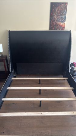 Black leather queen bed frame