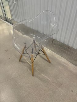 Lucite shell chair… 27” high , 24” depth , 25” wide . $50