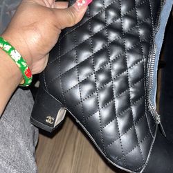 Black Chanel leather boots