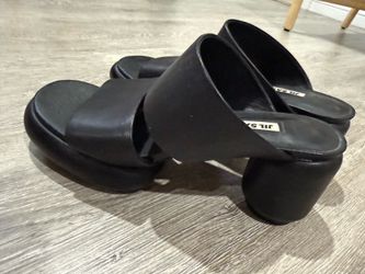 Black woman’s sandals